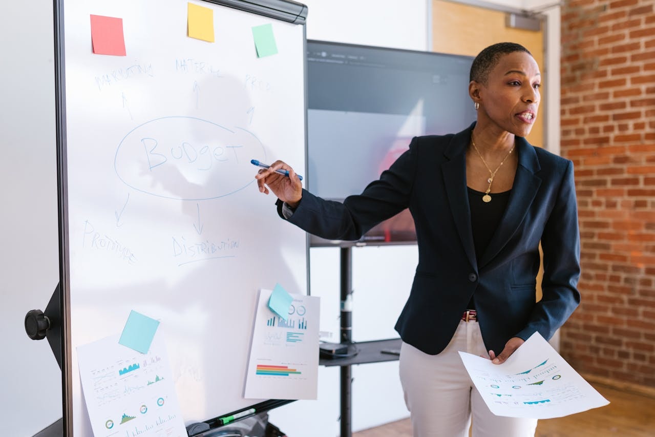 Woman pointing on the board