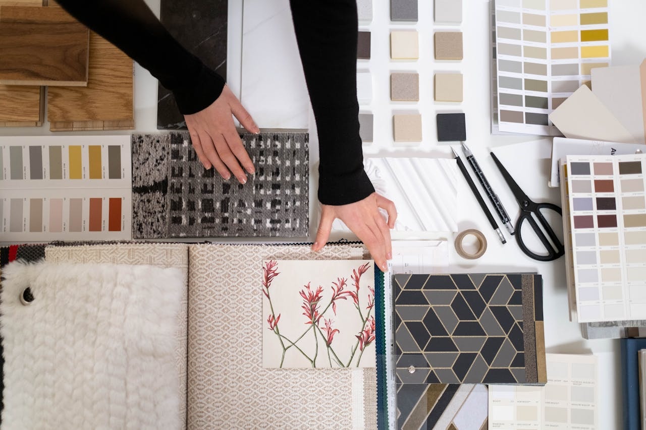 woman-hands-reaching-for-decorative-samples