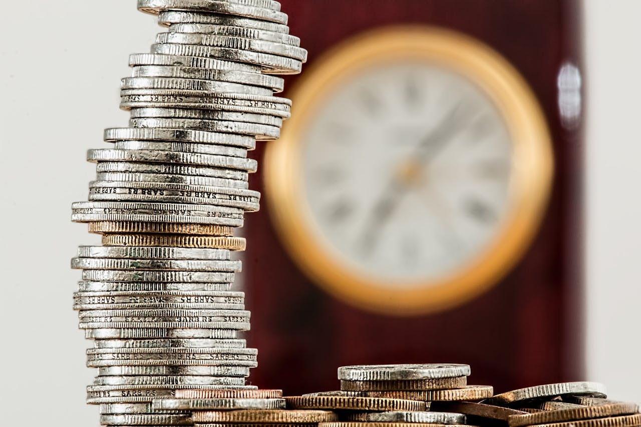 selective-focus-photo-of-stacked-coins